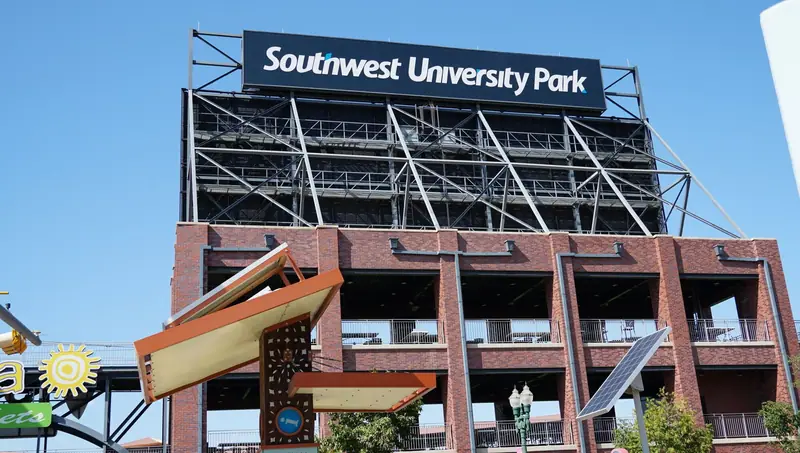 Southwest University Park sign above the brick ballpark facade in downtown El Paso