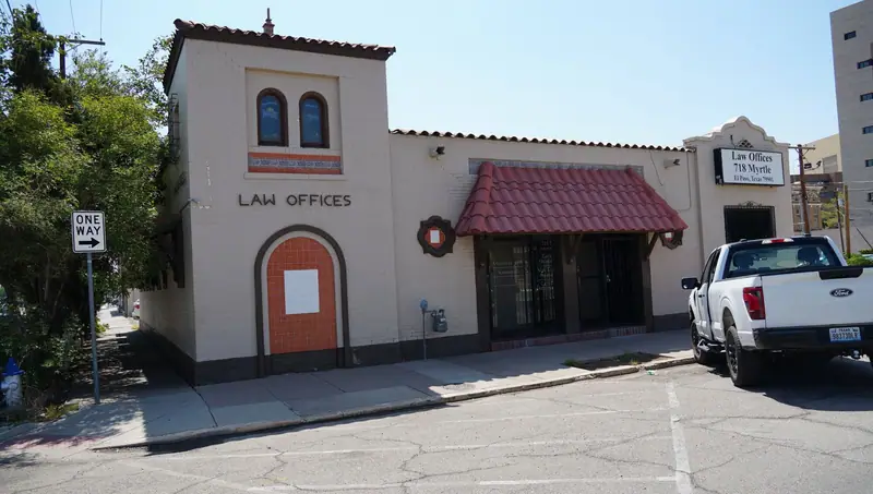 Street view of the Law Offices building at 718 Myrtle Avenue in El Paso with its red-tile awning and entrance